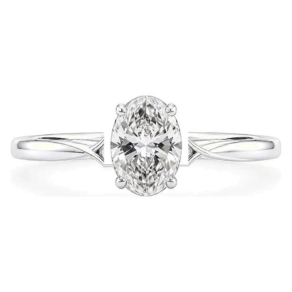 Twist-Shank Solitaire · Oval in 14K white gold