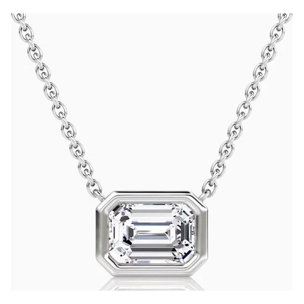 Bezel Emerald Solitaire Pendant in white gold