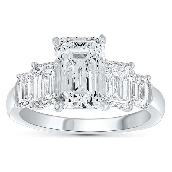 Graduated Emerald Engagement Ring in white gold