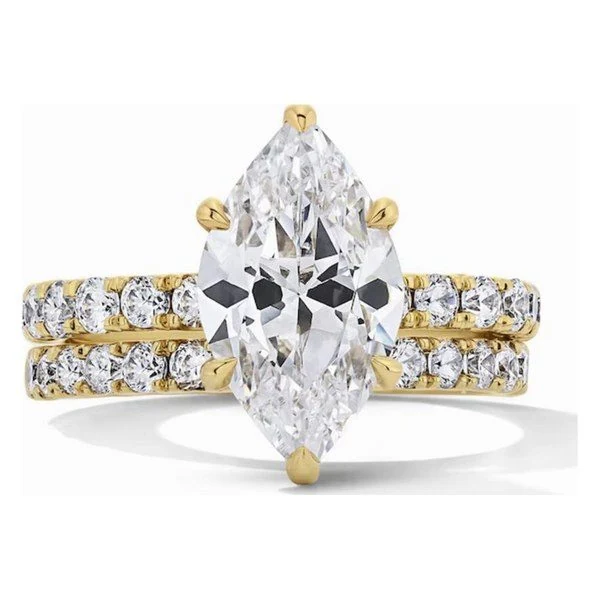Hidden Halo Bridal Set · Marquise in 14K yellow gold