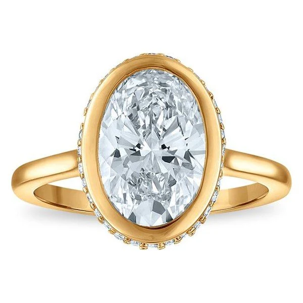 Bezel Solitaire Plus · Oval in yellow gold